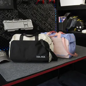Stylish nylon travel duffel bag with wet and dry separation for fitness and sport use.