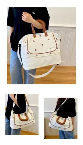 Canvas travel weekender bag with shoulder strap, large capacity gym and storage duffel.