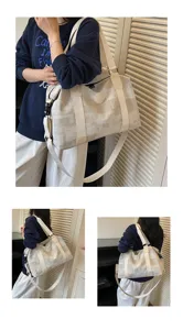 Retro plaid large capacity travel duffel bag with shoulder strap for gym sports and fitness.