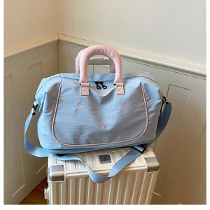 Large capacity travel duffel bag with bow embroidery, perfect for short trips and gym use.