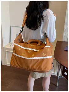 Large capacity bow travel bag with dry wet separation, perfect for swimming and fitness storage.