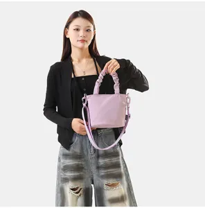 Sac seau bandoulière en toile de couleur unie minimaliste, sac décontracté tendance pour été.