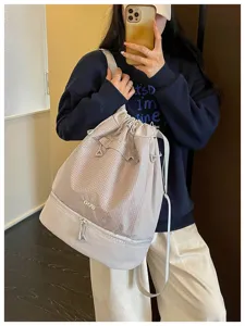 Sac à dos imperméable à cordon avec compartiment inférieur pour le sport et le fitness.