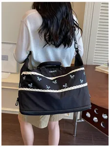 Large capacity travel bag with cute bow embroidery and white lace trim for women.