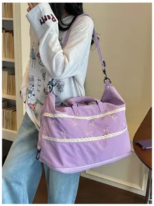 Large capacity purple travel duffel bag with lace trim and cute bow embroidery details.