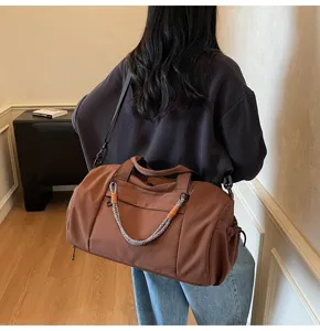 Gran bolsa de viaje impermeable para mujer, bolso deportivo de hombro para gimnasio.