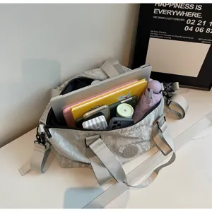 Large capacity travel duffel bag in gray crinkled fabric, perfect for gym and daily commute.