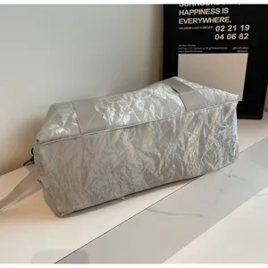 Silver crinkled texture travel duffel bag large capacity gym sports bag for outdoor use.