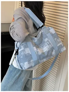 Large capacity retro blue checkered travel duffel bag with multi-functional design for gym.