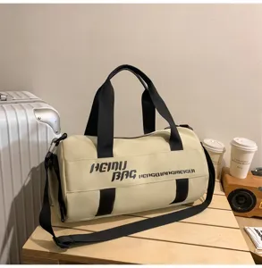 Large capacity cylinder travel duffel bag with dry wet separation for sports and gym fitness.