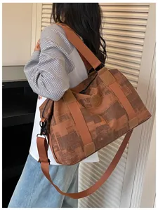 Vintage large capacity travel duffel bag for women, multi-functional fitness PU leather gym bag.