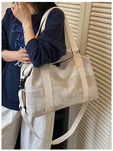 Retro grid large capacity travel duffel bag with PU texture for fitness yoga sports and gym use.