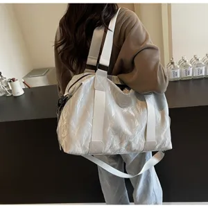 Large capacity travel duffel bag for sports gym fitness and weekend trips with durable shoulder strap.