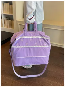 Large purple travel duffel bag with cute bow embroidery and lace trim for gym and weekend trips.