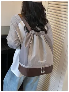 Sac à dos cordon décontracté avec séparation humide et sèche, motif à carreaux, grande capacité.