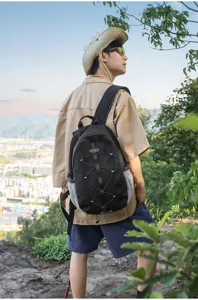 Outdoor black hiking backpack detail view, large capacity sports rucksack for travel and school.