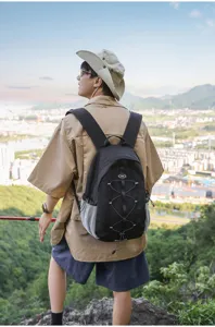 Outdoor black hiking backpack with large capacity, bungee cord and mesh side pockets.