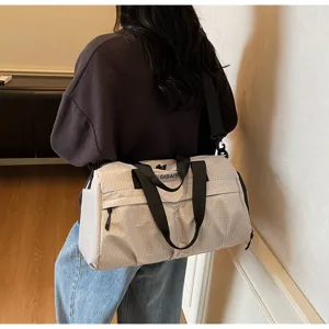 Grand sac de voyage sport fitness impermeable avec bandouliere pour femme et week-end