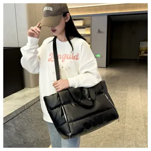 Black quilted gym bag for women, large capacity travel tote with shoulder strap