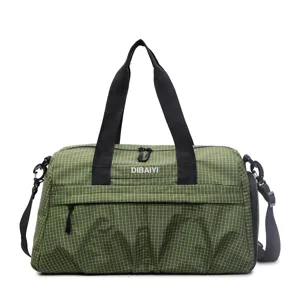 Grand sac de voyage quadrillé vert avec bandoulière pour le sport, le fitness et les voyages.