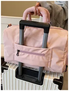 Large capacity travel duffel bag with trolley sleeve waterproof pink gym bag for women