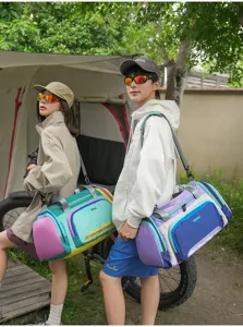 Outdoor travel duffel bag detail, large capacity gym sports bag carried by models in camp.