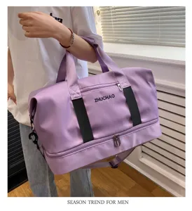 Detailed view of the large capacity travel duffel bag with wet dry separation compartment.