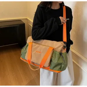 Large capacity travel duffel bag with wet and dry separation, perfect for gym and business trips.