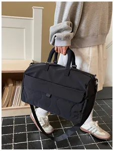 Large capacity travel duffel bag, lightweight water-repellent gym bag with wet dry separation.