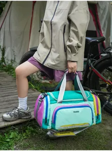 Outdoor travel duffel bag detail showcasing colorful design and large capacity storage.