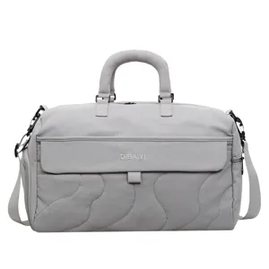 Large capacity gray travel duffel bag for women, lightweight waterproof fitness gym bag.