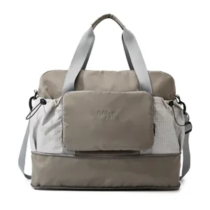 Large capacity travel duffle bag waterproof gym bag with separate shoe compartment and pockets.