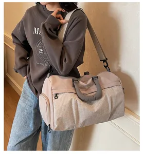 Large capacity travel gym duffel bag with dry wet separation and shoe compartment.