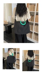 Large capacity travel bag for women, waterproof, expandable, lightweight shoulder bag.
