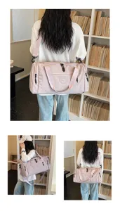 Pink waterproof travel duffel bag with adjustable strap, durable gym bag for daily use.