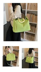 Large capacity travel duffel bag for women, lightweight waterproof shoulder crossbody bag for short trips.