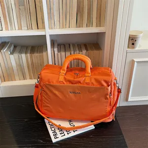 Large capacity travel duffel bag orange short trip luggage bag expandable sports gym bag