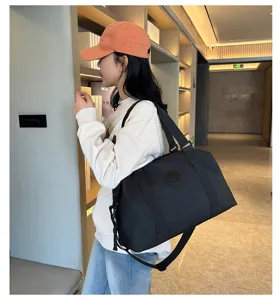 Large capacity black oxford cloth travel duffel bag, waterproof fitness gym bag for women.