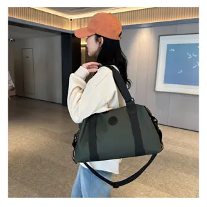 Waterproof Oxford cloth fitness gym bag with spacious interior for travel and daily sports.