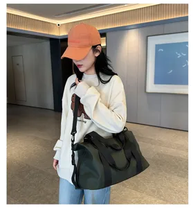 Large capacity oxford cloth fitness bag for women, waterproof travel and yoga duffel bag.