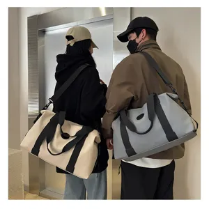 Detailed view of large capacity waterproof gym duffel bag, casual travel shoulder bag for daily use.