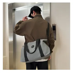Large capacity Oxford cloth gym bag, waterproof travel duffel bag for fitness and short trips.