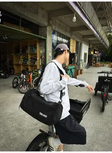 Large capacity travel duffel bag with shoulder strap, lightweight waterproof sports gym bag for men.