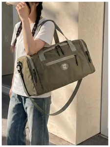 Waterproof durable travel duffel bag with shoulder strap, ideal for sports, gym, and trips.