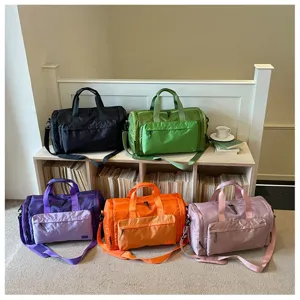 Detailed view of the multi-color waterproof travel duffel bag with wet dry separation design.