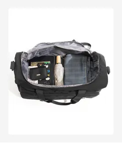 Large capacity black nylon travel duffel bag, multi-functional sports gym shoulder bag detail.