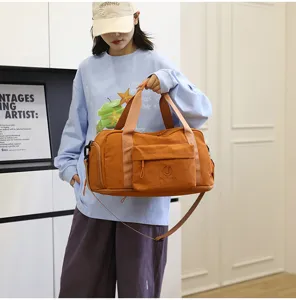 Waterproof travel duffel bag for men and women, large capacity foldable gym luggage bag.