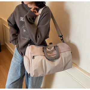 Large capacity travel gym bag detail shot, stylish lightweight shoulder crossbody duffel bag.