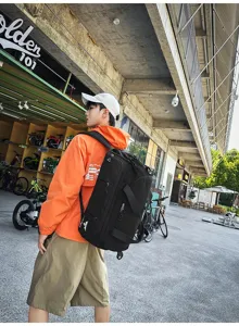 Multi-purpose large capacity nylon travel backpack, stylish durable sports duffel bag for men.