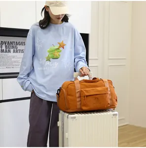 Large capacity waterproof travel duffel bag with trolley sleeve and adjustable shoulder strap.
